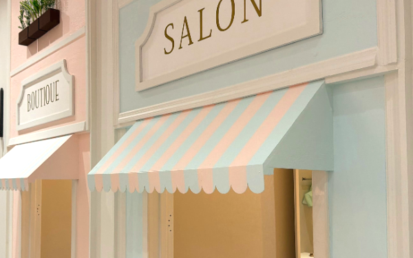 Salon and boutique shopfronts on the high street